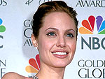 11 Years Ago: Angelina Jolie Jumps Into a Pool