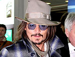 Johnny Depp Touches Down in Rome