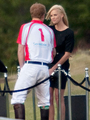 Prince Harry Chats with Charlize Theron
