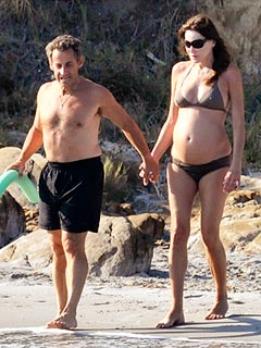 PHOTO: Carla Bruni Shows Off Baby Bump – in a Bikini | Carla Bruni