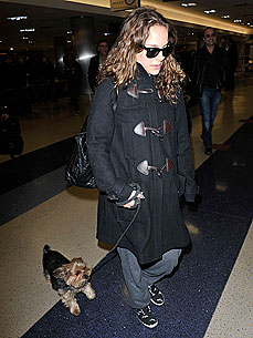 Spotted: Natalie Portman and Whiz Touch Down for Oscars!