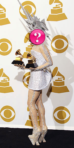 Who accepted two Grammys in an out-of-this-world ensemble?