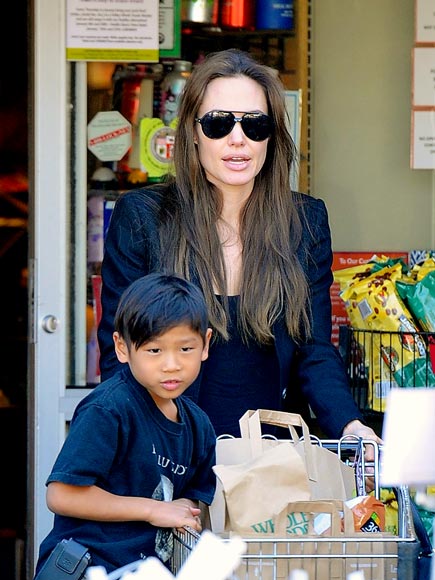 CART WHEELIN' photo | Angelina Jolie