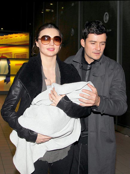 BABE IN ARMS photo | Miranda Kerr, Orlando Bloom