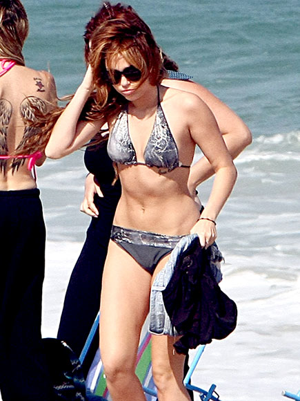 BEACH RETREAT
 photo | Miley Cyrus