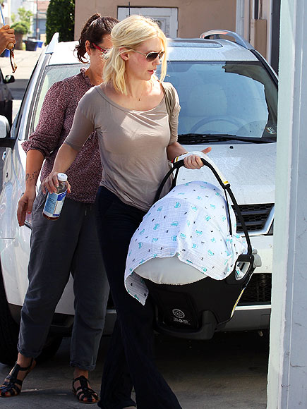 MOMMY MUSCLES photo | January Jones