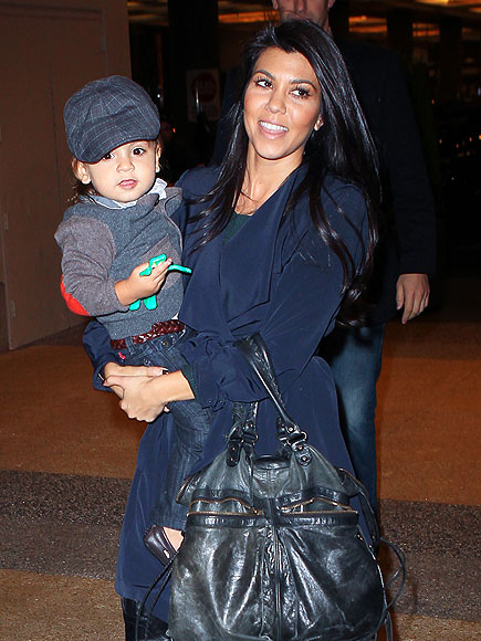 TOYING AROUND photo | Kourtney Kardashian