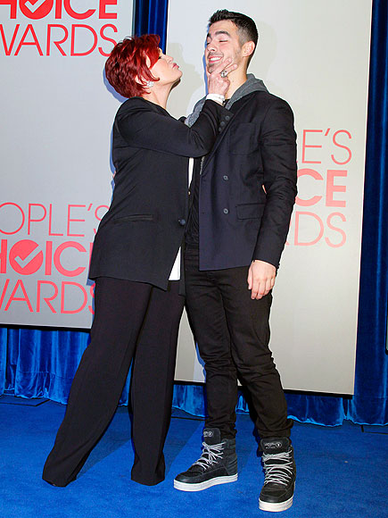 GETTING CHEEKY
 photo | Joe Jonas, Sharon Osbourne