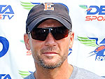 Tim McGraw Picks Up a Gun (and Takes Aim) for Charity | Tim McGraw