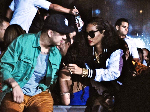  Rihanna Sulks as Chris Brown Parties with Christina Milian in LA  