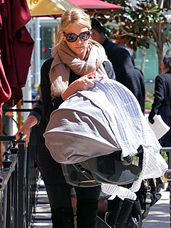 PHOTO: Charlize Keeps Jackson Under Wraps | Charlize Theron
