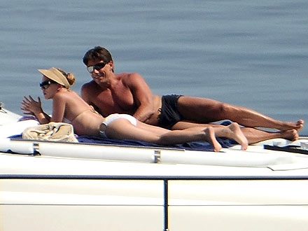 Scarlett Johansson Catches Rays with 'Security Guard' in Italy