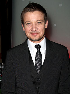 Jeremy Renner Gets Handy to Rein His Dogs In