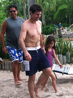 Tom Cruise and Suri Catch Waves at Disney World Surf Pool| Walt Disney World, Suri Cruise, Tom Cruise