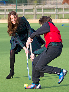 PHOTO: Kate Plays Field Hockey in High-Heeled Suede Boots | Kate Middleton