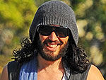 Russell Brand Finds Comfort in the Arms of a Rescue Puppy | Russell Brand