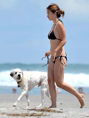 Olivia Wilde Loves to Body Surf – with Her Dog!