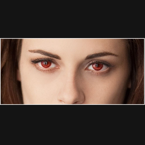 What color is Bella wearing at the end of Breaking Dawn – Part 1, when she wakes up as a vampire?