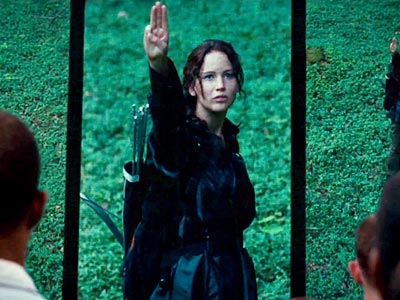 Katniss sends a symbol of hope and defiance in The Hunger Games