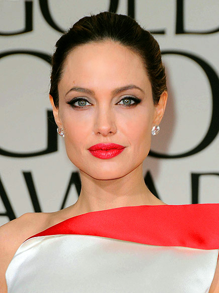 BUTTONED UP
photo | Angelina Jolie