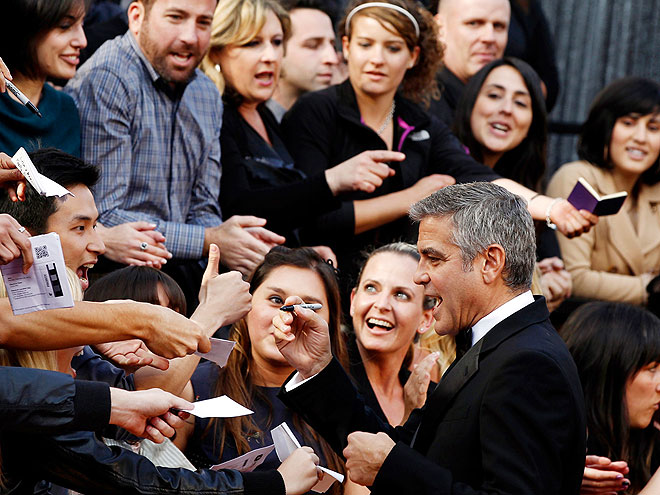 SIGNATURE CHARM
photo | George Clooney