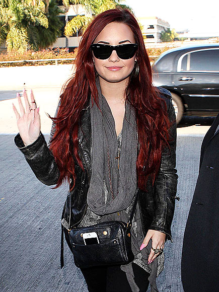 JET SETTER  photo | Demi Lovato