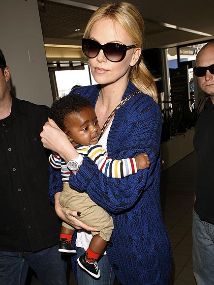 CUTE CARGO
 photo | Charlize Theron