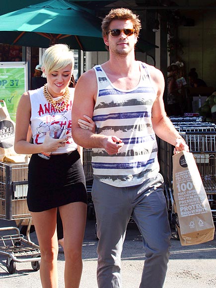 ARM CANDY photo | Liam Hemsworth, Miley Cyrus