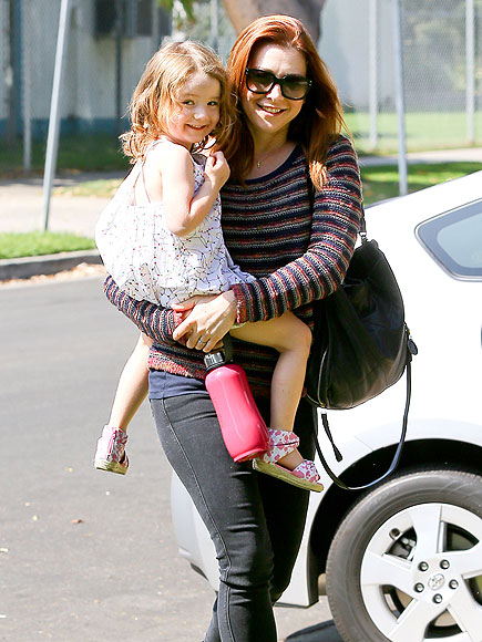 ONE HIP MOM photo | Alyson Hannigan
