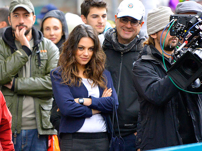 CAMERA SHY photo | Mila Kunis
