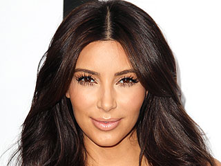 Make Waves with Kim's Dark Locks