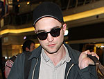 Off-Duty Hollywood: Robert Pattinson Plays the Role of Luggage Handler at LAX | Robert Pattinson
