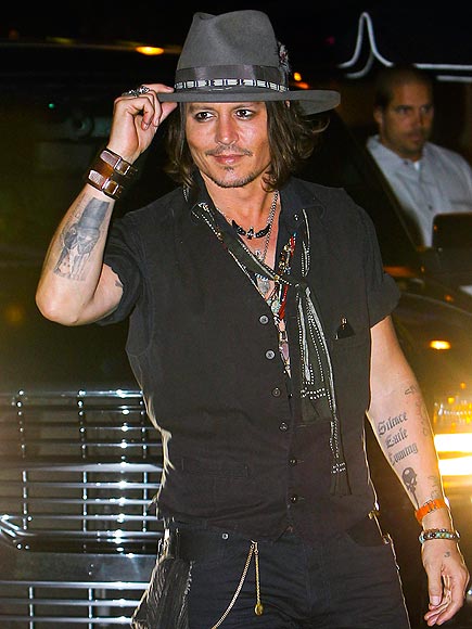 johnny depp a map of his tattoos forearms people com johnny depp a map of his tattoos forearms people com
