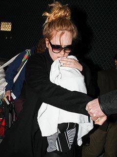 PHOTO: Adele Arrives (with Baby!) in L.A. for the Golden Globes