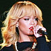 VIDEO: Rihanna Hits Fan with Microphone at Concert