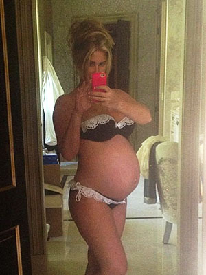 Kim Zolciak and Her Double-Bump Hit the Pool in a Bikini