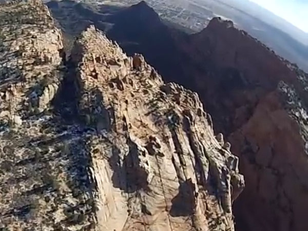 First-Person Footage of a Wingsuit Flight Through a Waterfall| Around the Web