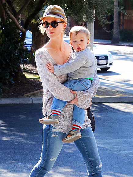 ADORABLE ARMFUL photo | January Jones