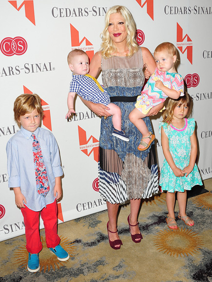 BALANCING ACT photo | Tori Spelling