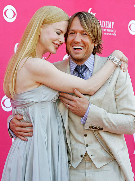 Eight Years, Eight Adorable Photos: Happy Anniversary Keith & Nicole!
