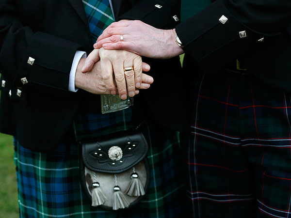 Larry Lamont and Jerry Slater take part in a symbolic same-sex marriage outside the Scottish Parliament in Edinburgh, Scotland