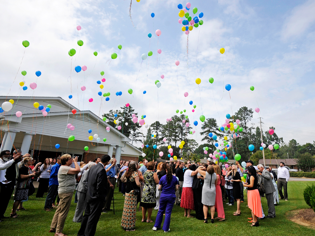 Mourners Pack Pews at Murdered Siblings' Memorial Service