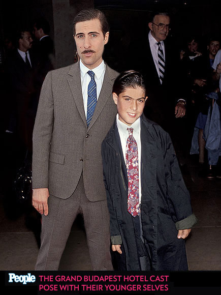 The Grand Budapest Hotel Stars Posing with Their Younger Selves| The Grand Budapest Hotel, Adrien Brody, Bill Murray, Harvey Keitel, Jason Schwartzman, Jeff Goldblum, Jude Law, Owen Wilson, Ralph Fiennes, Tilda Swinton, Wes Anderson, Willem Dafoe