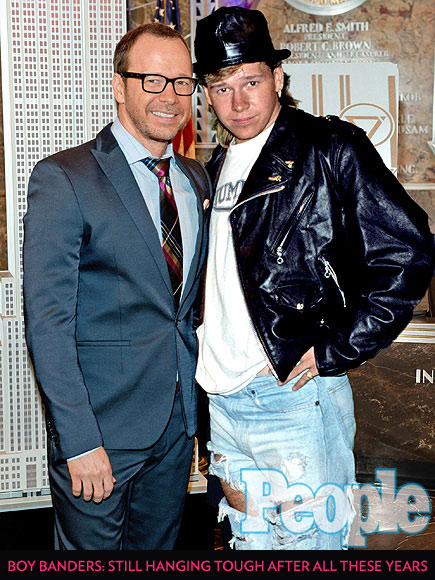 Backstreet Boys' Millennium Turns 15: See Nick Carter and Other Boy Band Hunks Posing with Their Younger Selves| Bobby Brown, Donnie Wahlberg, Joe Jonas, Justin Timberlake, Nick Carter, Nick Lachey, Ricky Martin, Zac Hanson