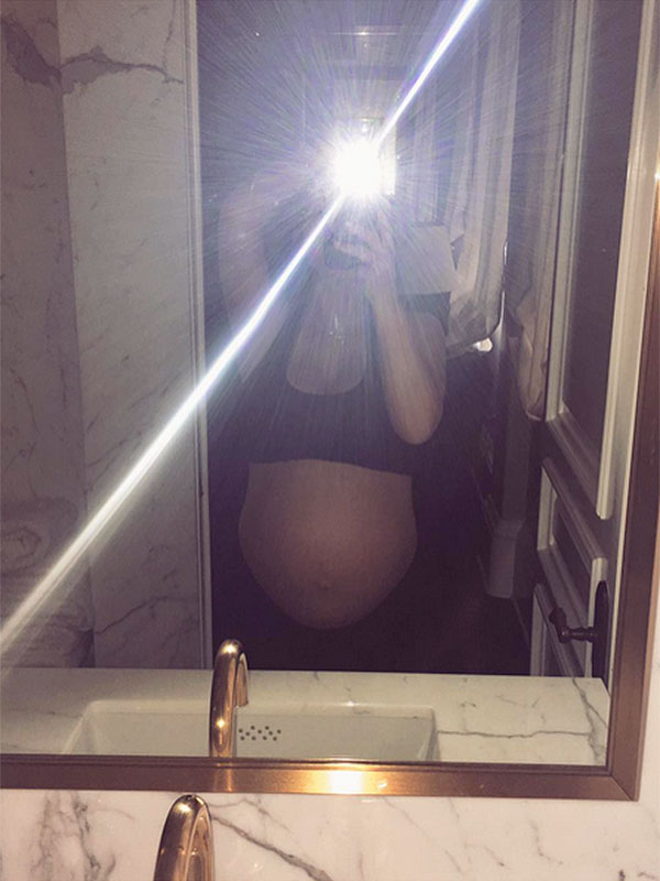 Kim Kardashian West shows off her baby bump during pregnancy