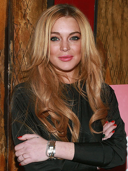 Bikini-Clad Lindsay Lohan Takes Freezing Ice Baths (See the Videos!) - People Magazine