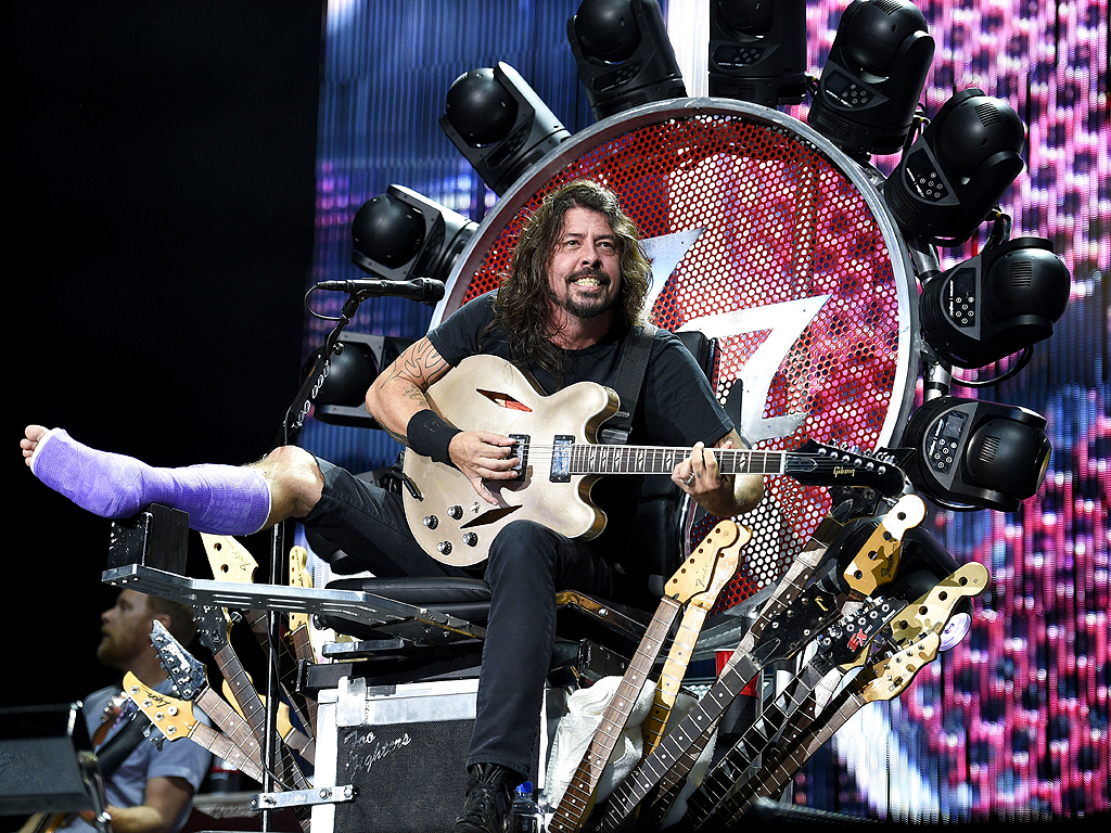 Watch Dave Grohl Rock Out with His Orthopedic Surgeon Onstage at Boston Foo Fighters Concert| Foo Fighters, Music News, Dave Grohl