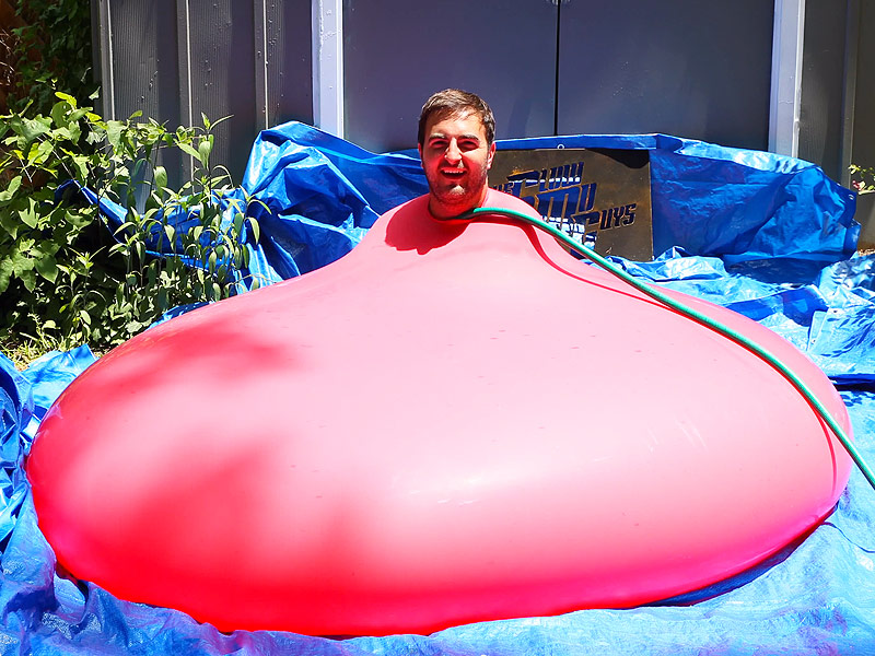 Watch a Guy Put Himself Inside a Giant Water Balloon (Spoiler Alert It