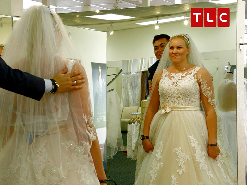 Guy shopping for wedding dress