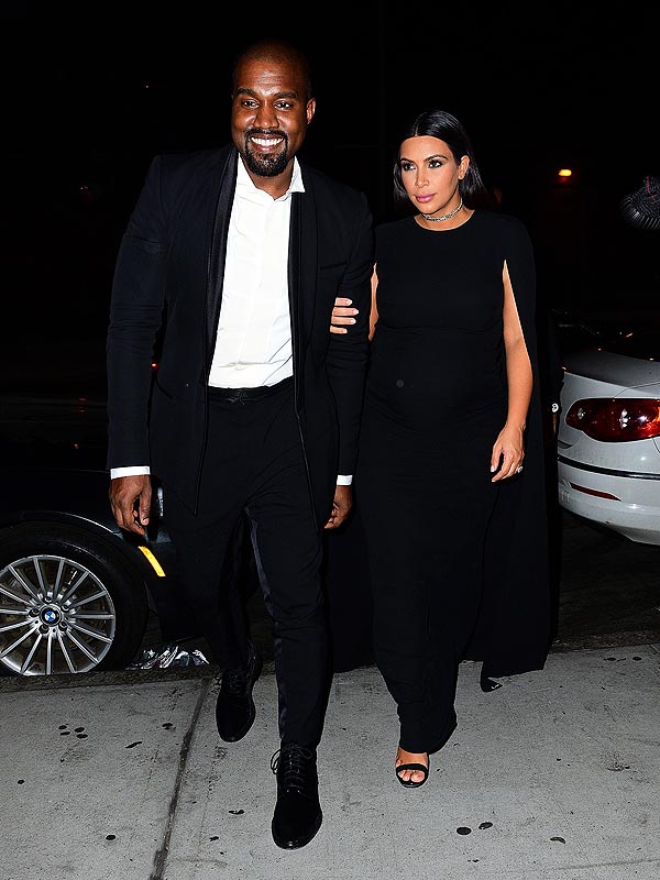  Super Kim to the Rescue! Kim Kardashian West Dons a Cape for NYC Wedding